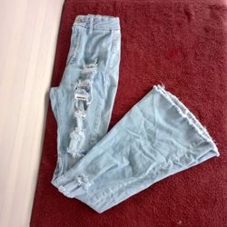 Rue 21 high rise ripped flare jeans size 4 