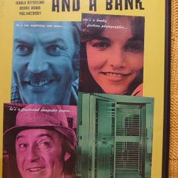 A Man A Woman And A Bank [DVD]