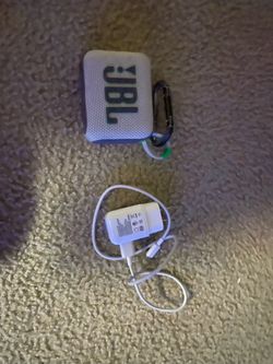 JBL Go 4 Portable Bluetooth Speaker and White Charger