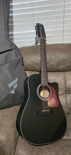 GUITARRA ELECTROACUSTICA DE 12 CUERDAS $220 OBO