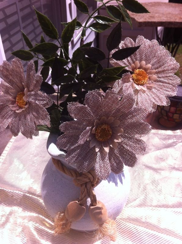 Ceramic vase with burlap flowers