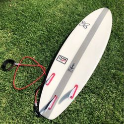 Infinity surfboard (5’11”) + fins & leash