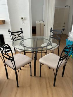 Table and 4 chairs.