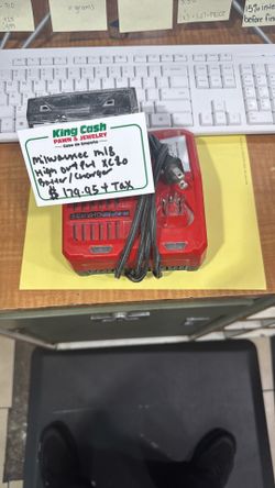 MIKWAUKEE CHARGER WITH BATTERY