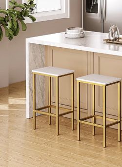 2 white and gold barstools