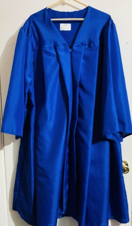 Jostens Blue Graduation Gown With Cap Graduation . New condition, excellent, very clean . Size 5’04” - 5’06” .