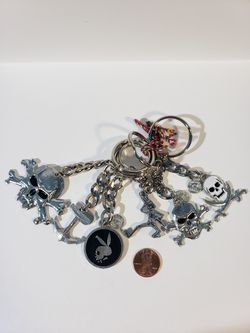 Lot of 6, New metal Skulls Keychains. Crossbones, Playboy, Swashbuckler, Anchor.