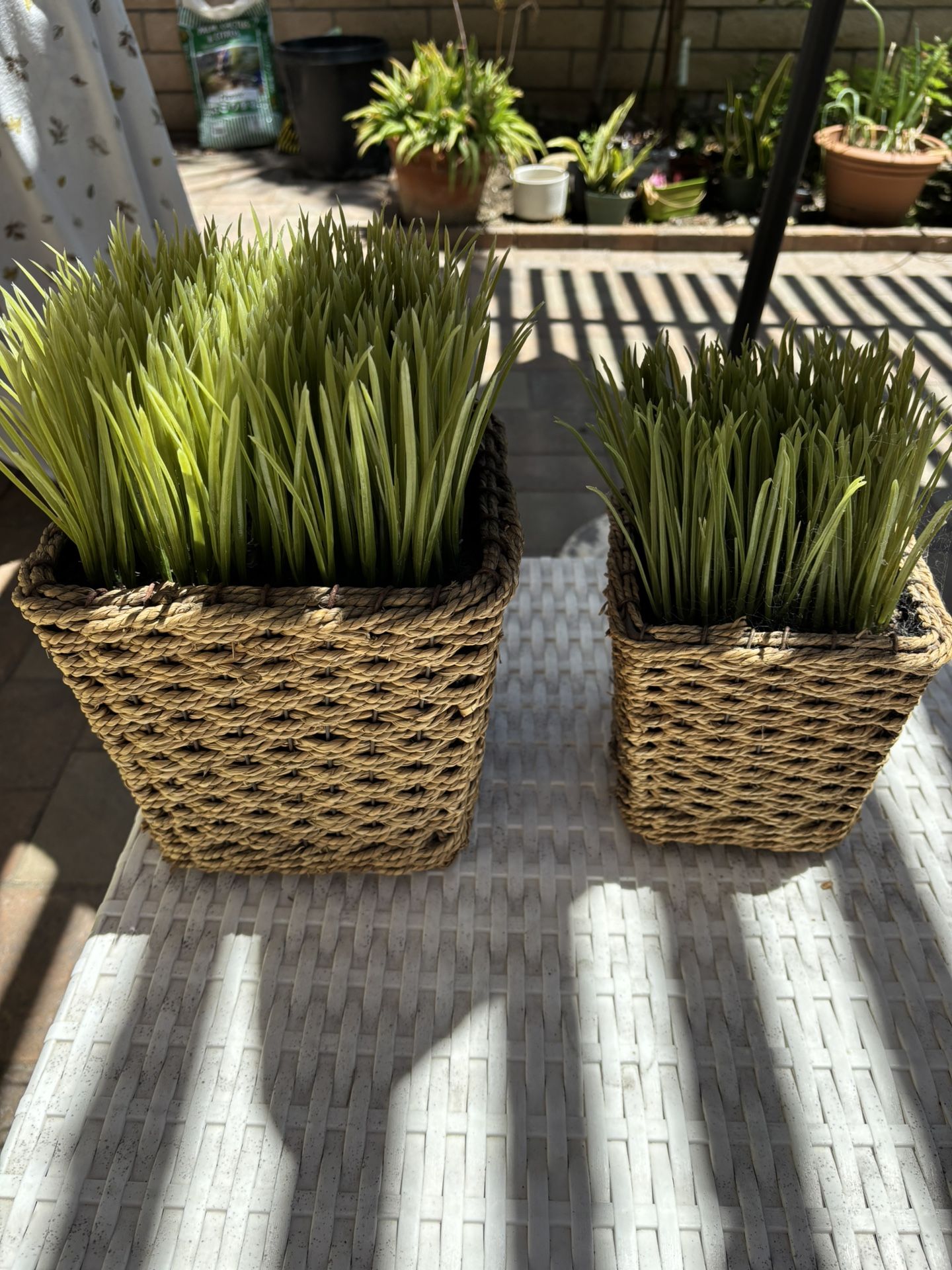 Set Of Two Woven Planters With Artificial Grasss