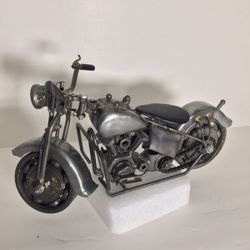 Custom motorcycle handmade out of nuts, bolts,acre