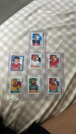 FIFA 2026 World Cup sticker cards and Coca Cola sticker cards.
