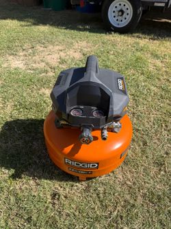 RIDGID
6 Gal. 150 PSI Portable Electric Oil-Free Jobsite Pancake Air Compressor with Dual Pressure Gauges and 2-Quick Couplers