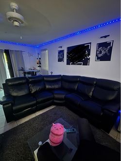 Black Leather Reclining Sectional Sofa