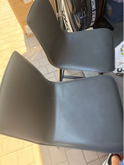 Gray and black barstools