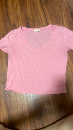 pink v neck shirt