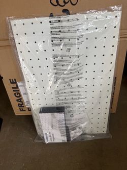 Pegboard + Storage Bin — $15 — NEW in Packaging