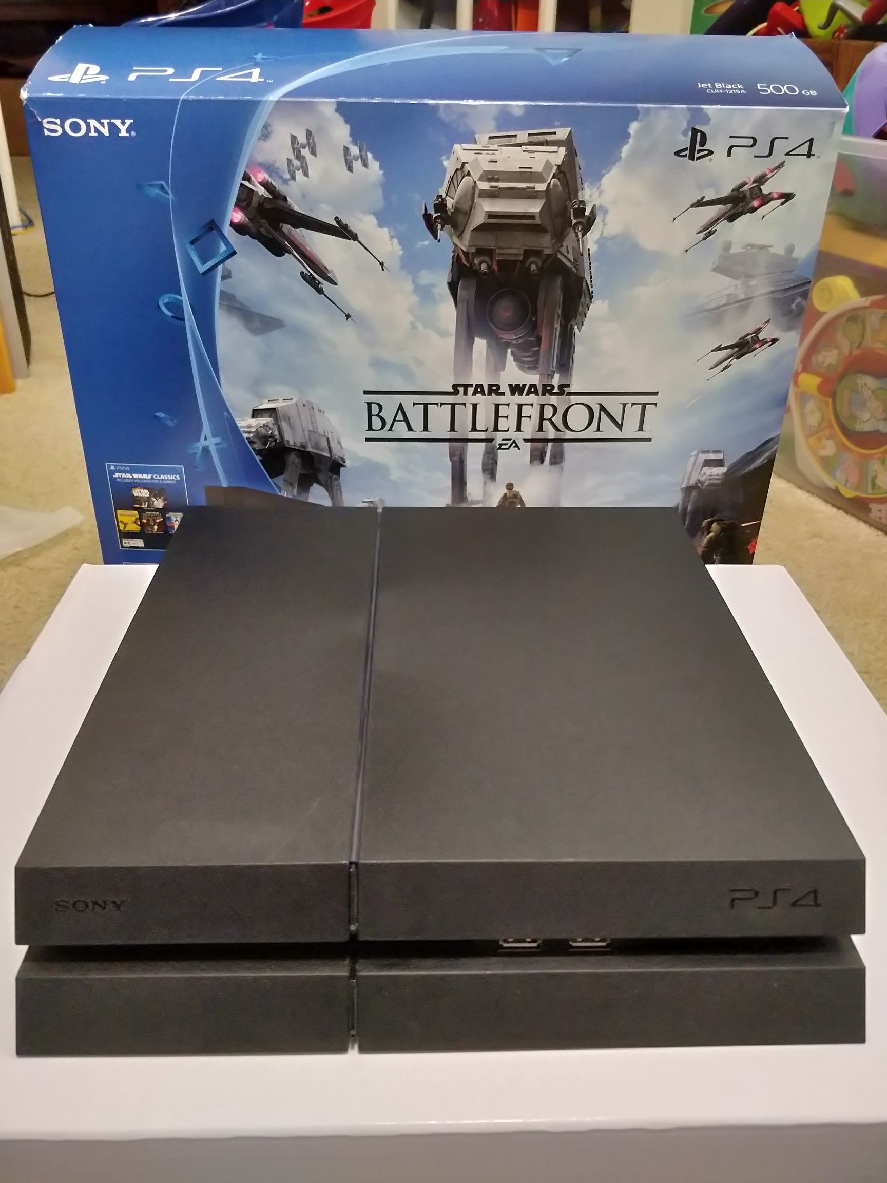 PS4 in Star Wars box with controller and cords