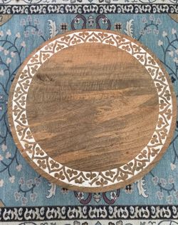 Carved Wood Rotating Server Display
