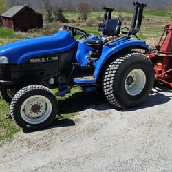 New Holland TC133 Tractor With Mower Deck And Snow Thrower