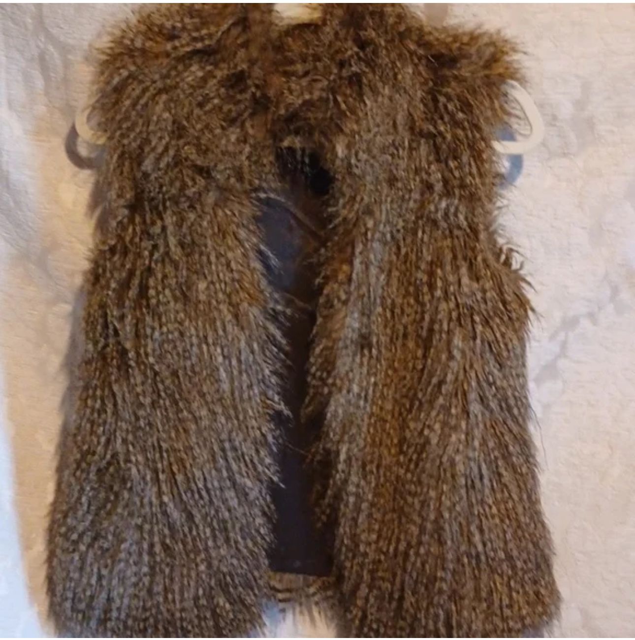 faux fur vest.