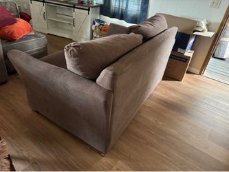 Brown loveseat couch