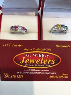 14 Kt white gold mothers ring only one