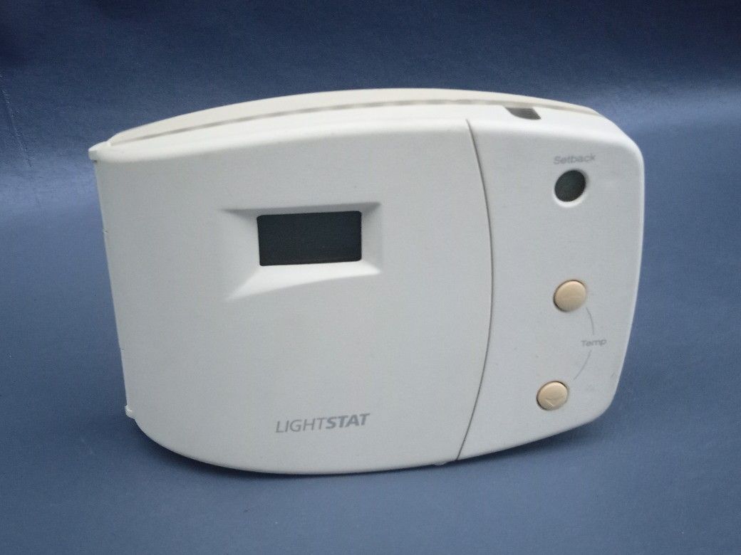 Lightstat TME thermostat light-sensing, automatic night setback thermostat. 1 Packs