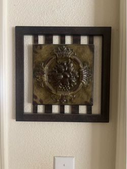 Metal framed artwork