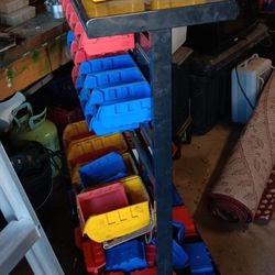 BOLTS OR NUTS OR? RACK W/ ROLLERS $80