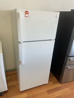 New refurbished GE top freezer
