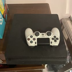 PS4 w/ white Controller Used 