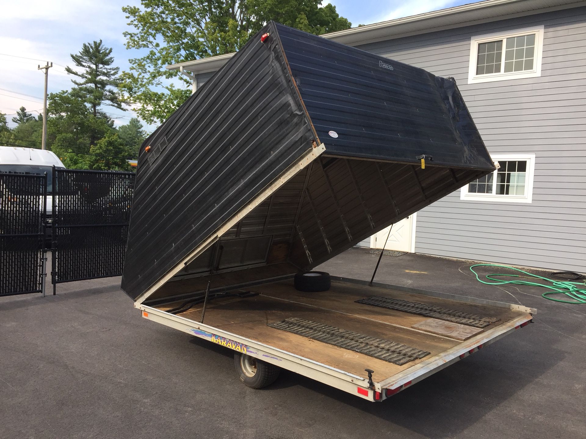 2001 Karavan 10’ x 101” enclosed clam shell snowmobile trailer will