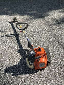 Husqvarna Gas String Trimmer that accepts attachments - Excellent Cond