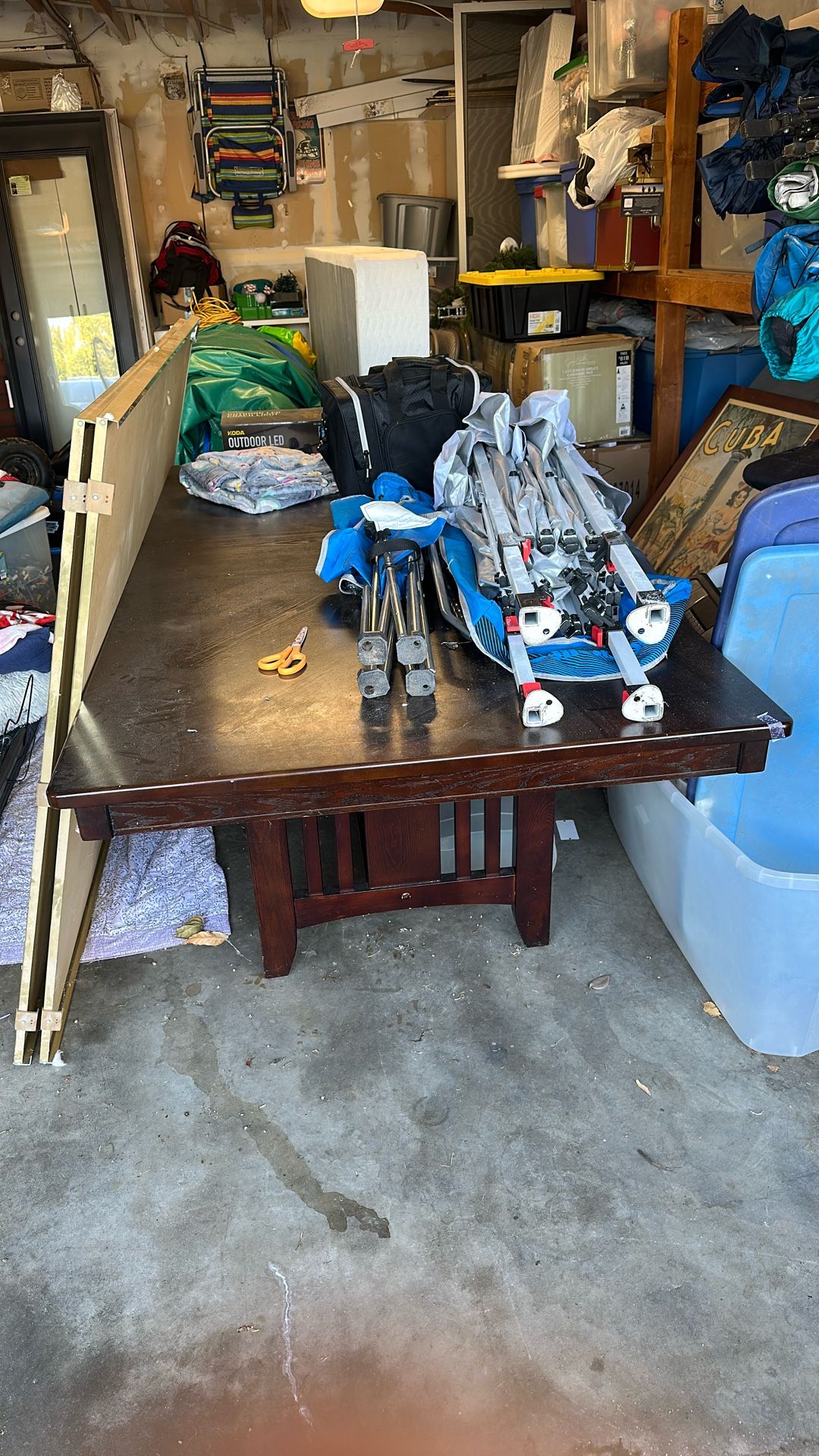 Free dining room table with expander. No chairs.