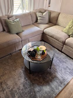 Round glass top coffee table