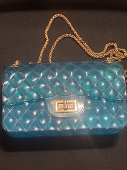 Blue purse with gold chain