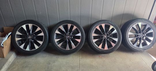 Seventeen inch nissan sentra rims with tires