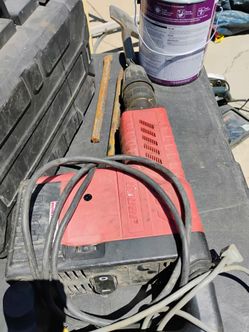 Jackhammer with $100 of attachments