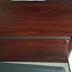 Wooden filing cabinet with lock and key