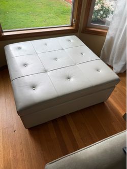 Light gray leather ottoman w storage