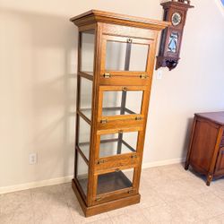 One 72” tall 4-tier antique oak tower display showcase cabinet glass panels and drop-front hinged NO KEY There is only 1 cabinet That is a mirror