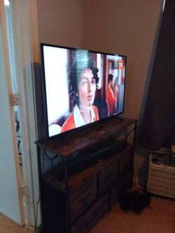42 inch LCD .;5 drawer tv stand. Polk soundbar. 20 takes all