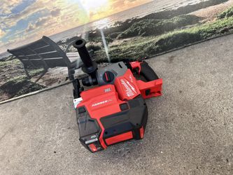 Milwaukee M18 FUEL SDS-Plus Rotary Hammer with a HAMMERVAC Dust Extractor $500