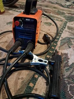Welder + Helmet+ Rods