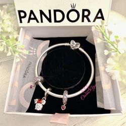 ORIGINAL PANDORA bracelet with 3 charms included.