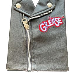 Grease T Bird 2 disc DVD in leather jacket  This Grease T Bird 2 disc DVD comes in a stylish leather jacket and is a must-have for any fan of musicals