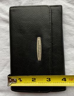 International Classics black wallet/ faux leather