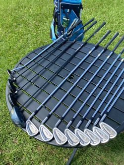 Golf clubs • Titleist • Ping