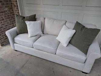 Pottery Barn light gray sofa