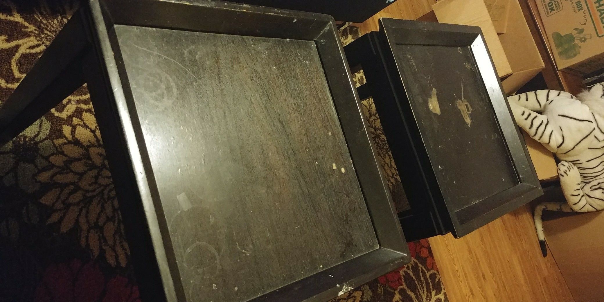 Two unique. Ashley Home Black wood end tables