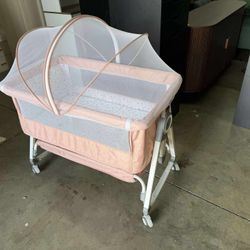 3 in 1 Baby Bassinet,Bedside Sleeper with Storage Basket and Wheels,pink